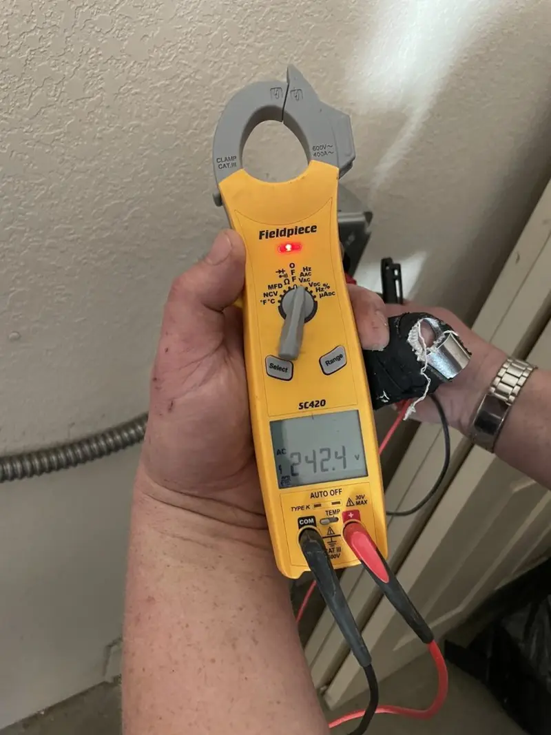 Voltage testing with clamp meter during Aluminum Wiring Replacement in De Queen